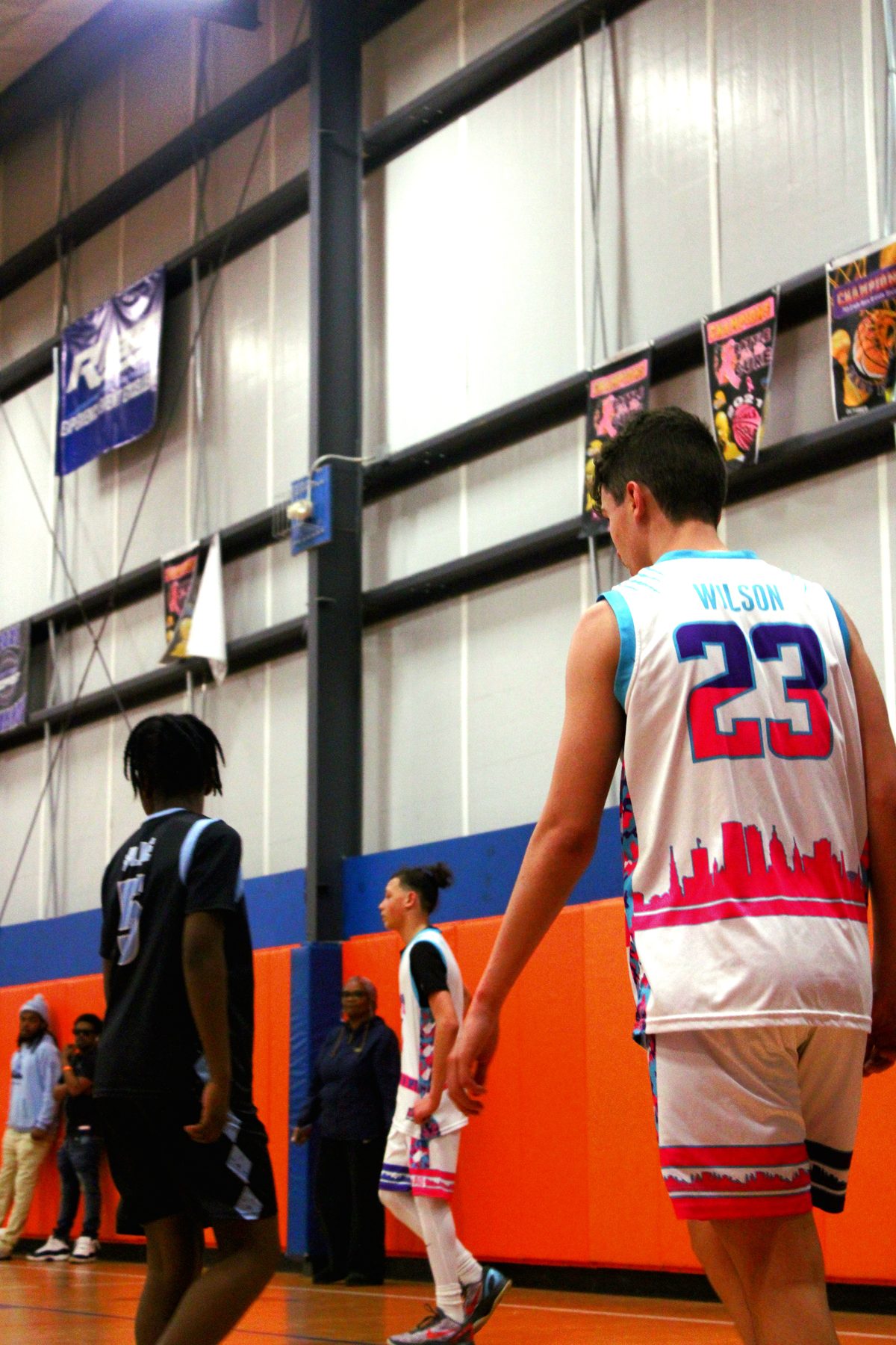 Youth basketball game in a Charlotte gym
