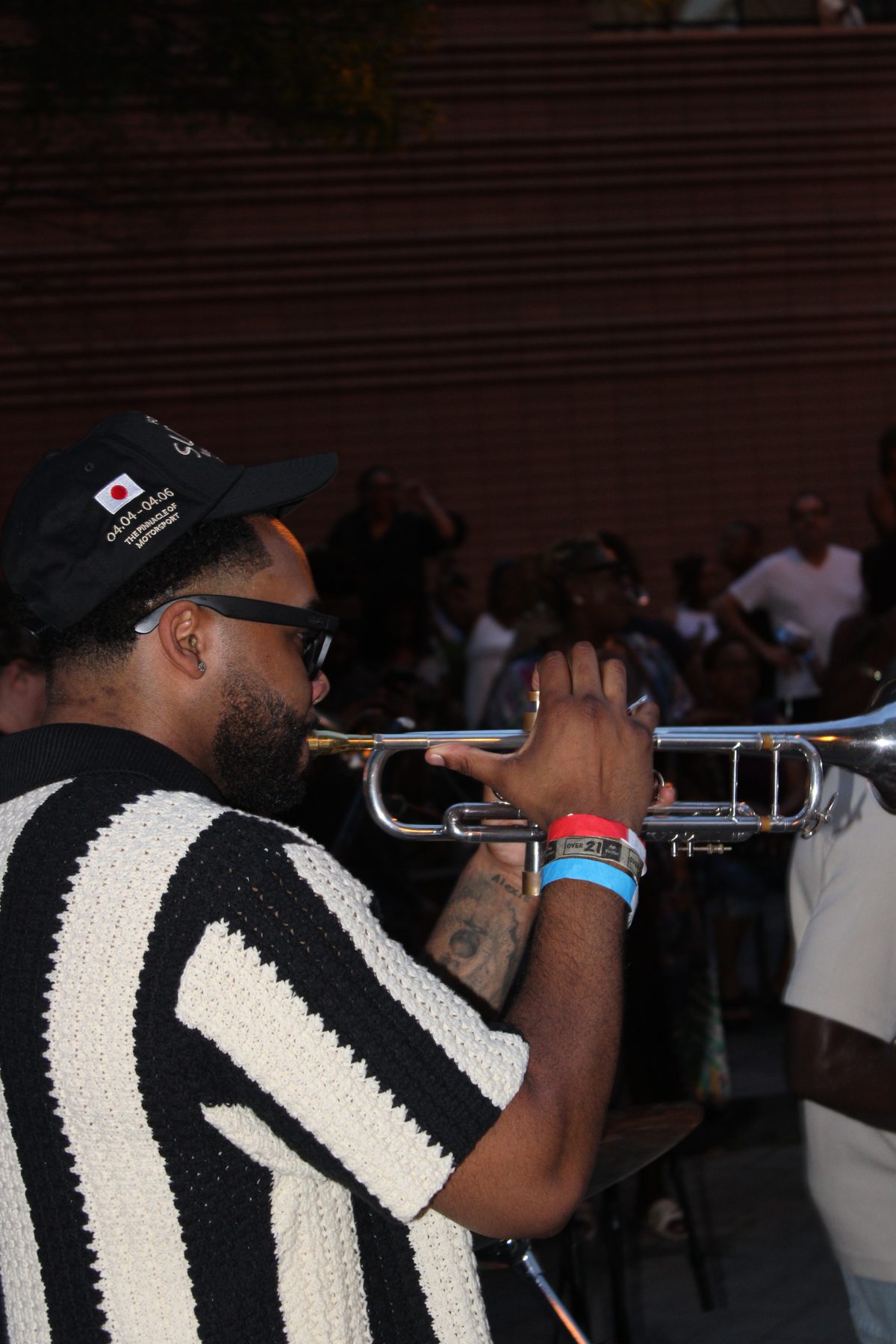 Trumpet player performing at a live show in Charlotte